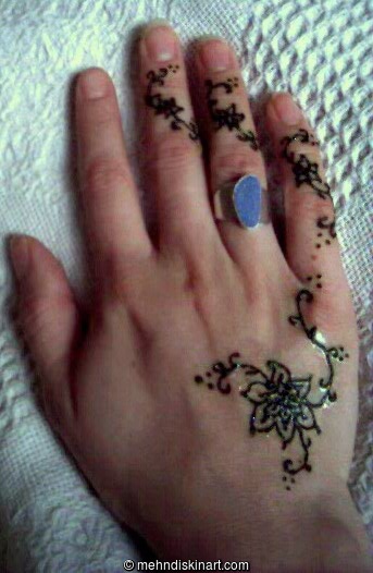 vine tattoo designs. hand tattoo designs.